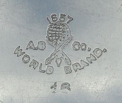 American Silver Co. World Brand 1857 stamp